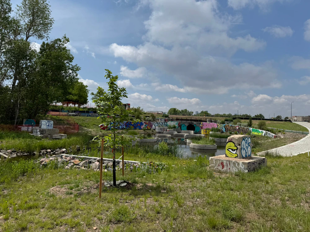 Art and cultural expression are integrated throughout the landscape, reflecting the identity of the surrounding community